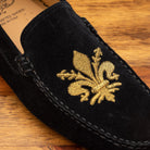 Up close picture of the gold embroidered fleur di lis on 5303 Calzoleria Toscana Black Venetian Suede Driver