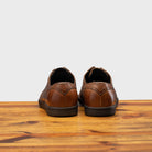 Back profile of 7839 Calzoleria Toscana Cerris Elba Slip-On on top of a wooden table