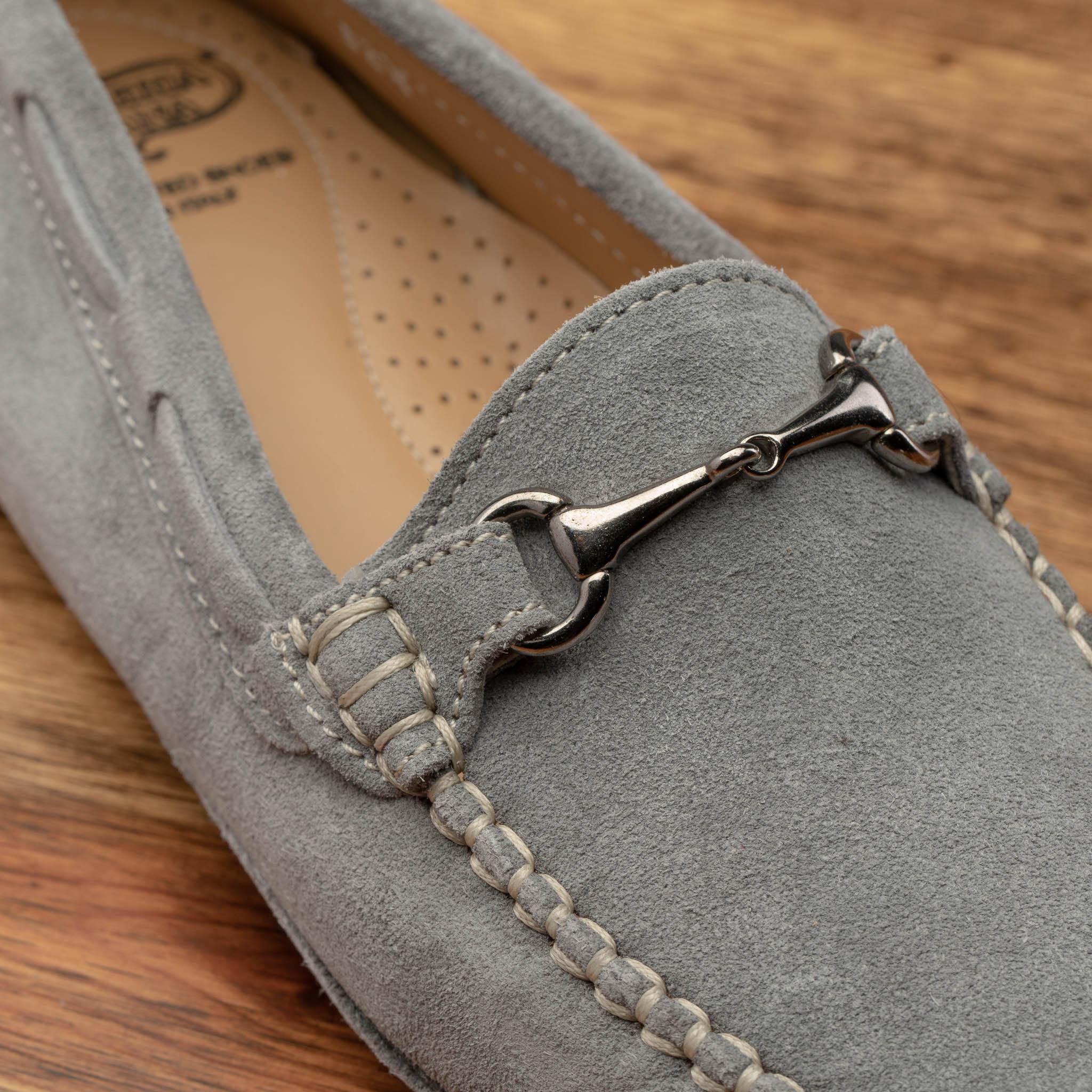 Up close picture of the vamp showing the contrast cream stitching and the metallic horsebit   8976 Calzoleria Toscana Women's Light Gray Suede Driver