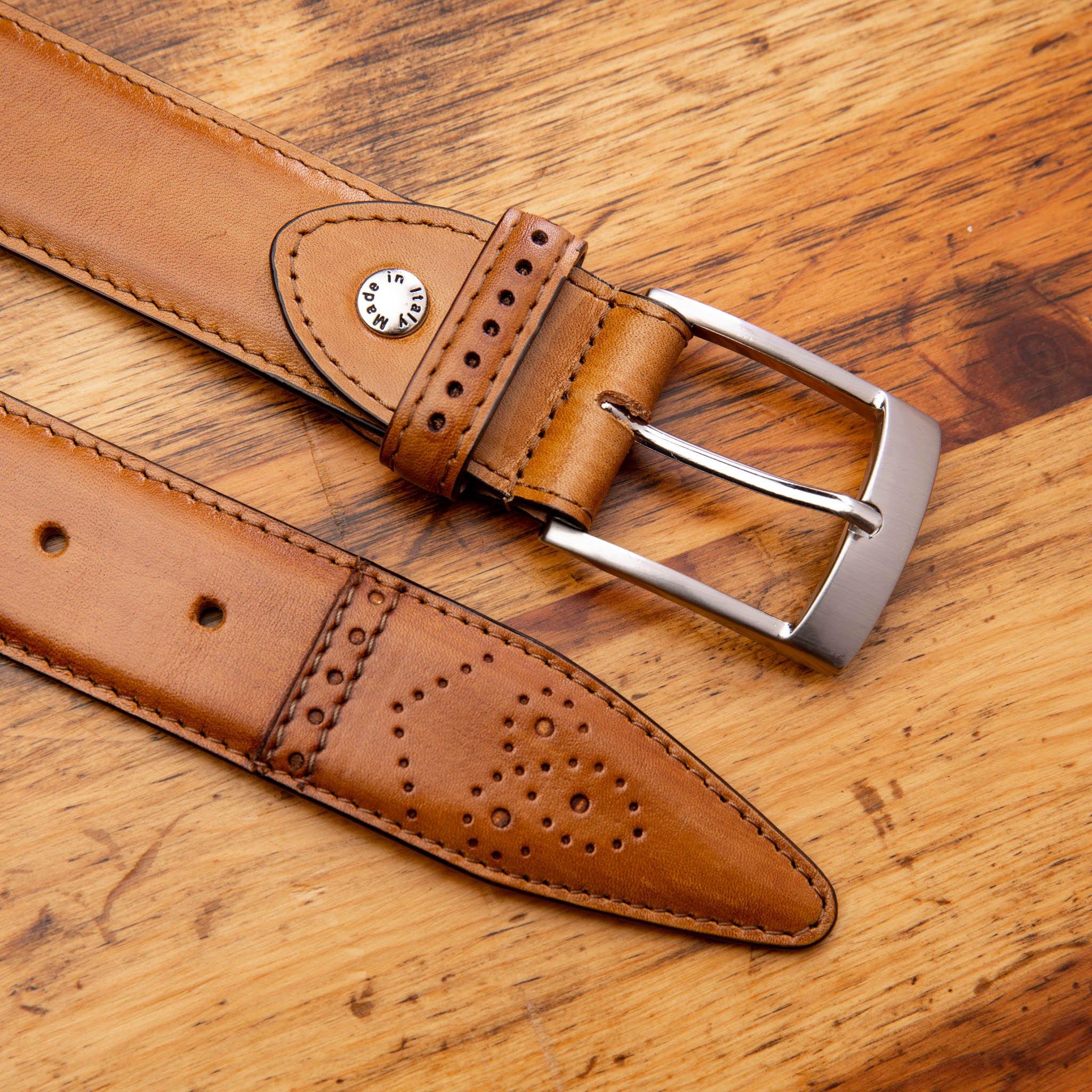 Up close picture of the silver buckle and the medallion tip of C1732 Calzoleria Toscana Chestnut Medallion Dress Belt