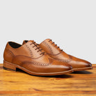 Profile of H310 Calzoleria Toscana Chester Onice Wingtip Balmoral on top of a wooden table