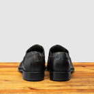 Back profile of H742 Calzoleria Toscana Black Balmoral Lace-up on top of a wooden table