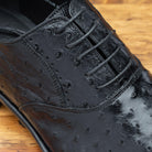 Up close picture of the vamp showing the 5 eyelet  of H777 Calzoleria Toscana Black Ostrich Cap Toe