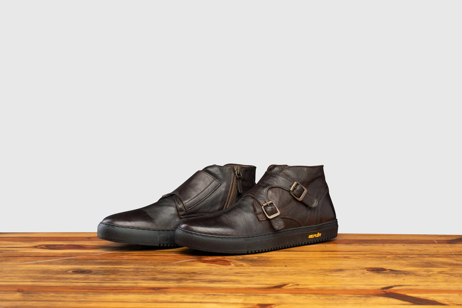 Completed pair of dip-dyed Calzoleria Toscana double-monk sneaker boots in dark espresso leather