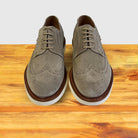 A pair of Chashmere suede shoe  on a wooden surface