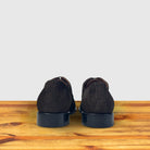 Dozza Dusty Brown suede oxford shoes, rear view of the pair showing the heel, dark suede finish and black leather sole on a wooden surface