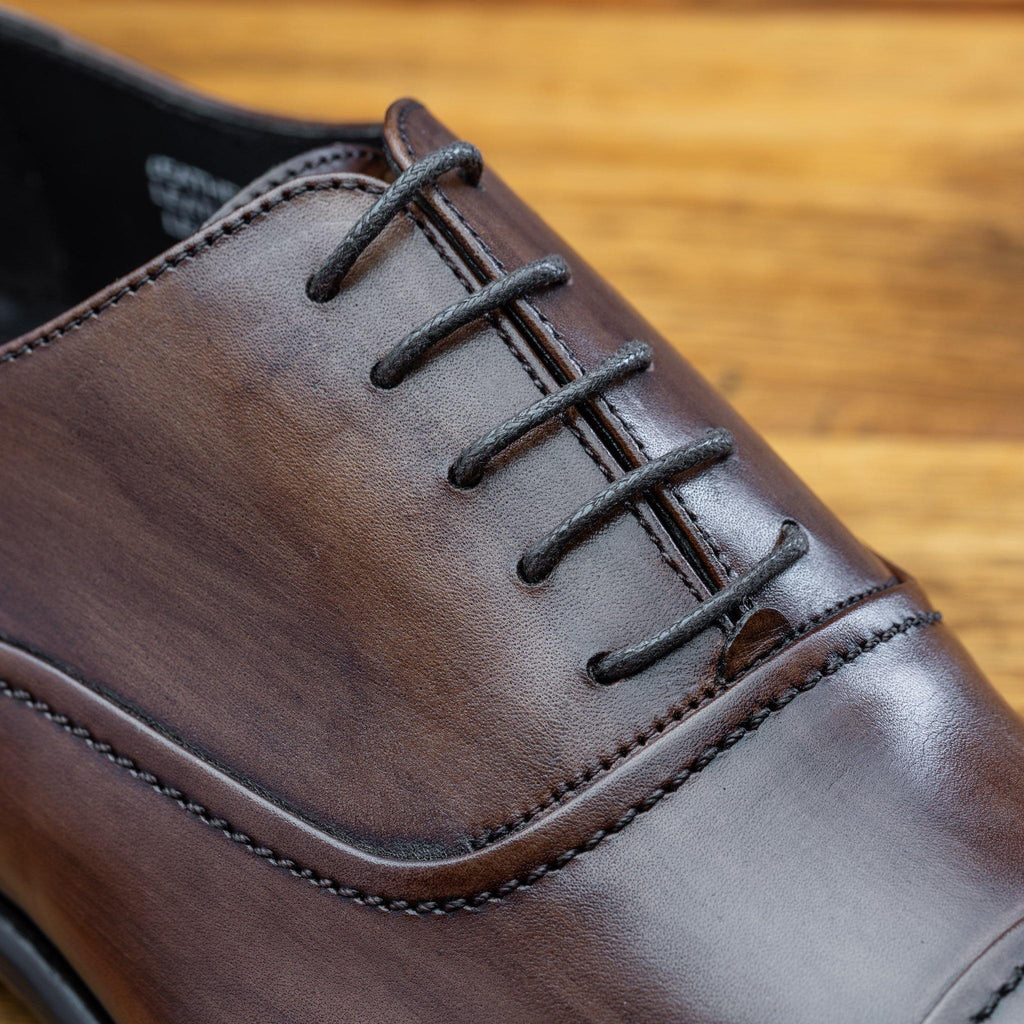 Up close picture of the 5 eyelet  of the 2361 Calzoleria Toscana Brown Cayenne Calf Cap Toe 