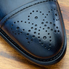 Up close picture of the Medallion Toe of the 2361 Calzoleria Toscana Blue Cayenne Calf Cap Toe