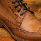 Up close photo of the vamp showing the wingtip details and eyelets of 9147 Calzoleria Toscana Brick Dip-Dyed Cesar Boot