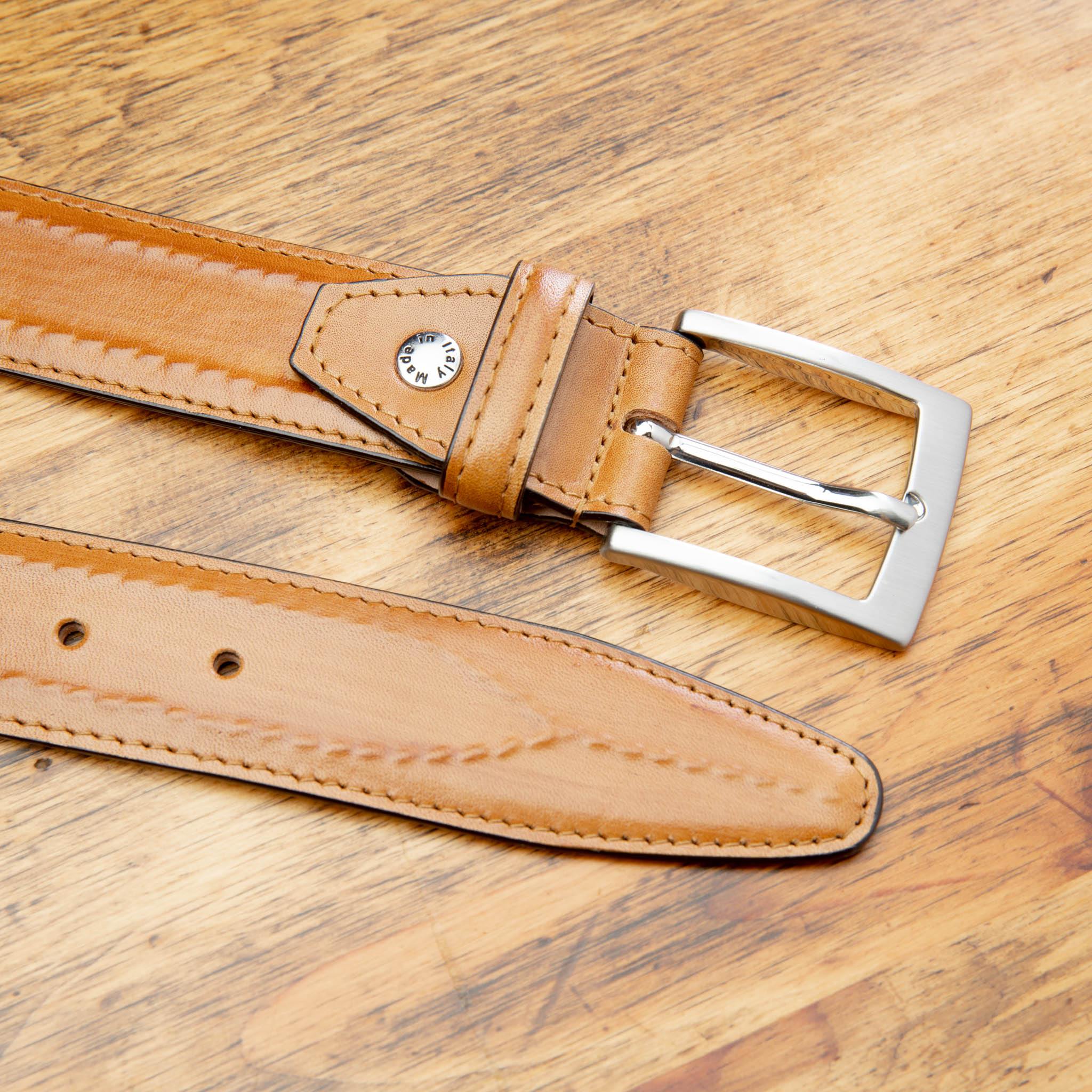 Up close picture of C2216 Calzoleria Toscana Chestnut Inner Stitched Dress Belt on top of a wooden table