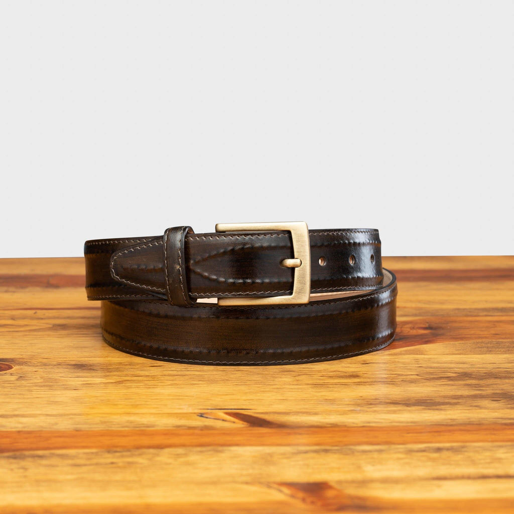 Front profile of C2216 Calzoleria Toscana Dark Brown Inner Stitched Dress Belt on top of a wooden table