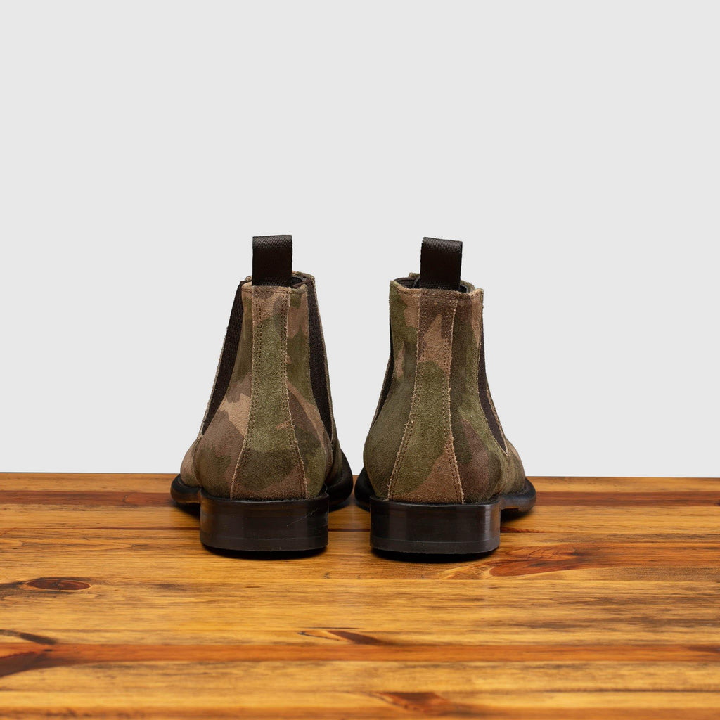 Back profile of D681 Calzoleria Toscana Posta Donna Boot in Camoflauge on top of a wooden table