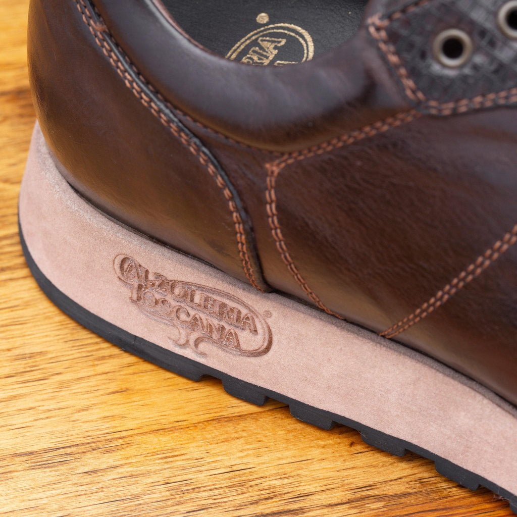 Up close picture of logo lasered onto the sole of H703 Calzoleria Toscana Dark Brown Sixty Seven Runner