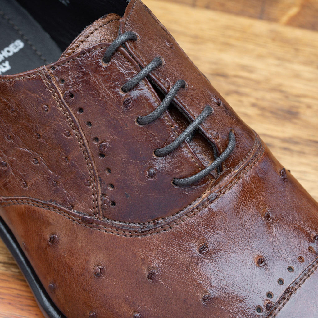 Up close picture of the vamp showing the 5 eyelet of H777 Calzoleria Toscana Cognac Ostrich Cap Toe
