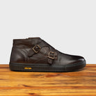 Side profile of H884 Calzoleria Toscana Dark Brown Dip-Dyed Double Strap Sneaker on top of a wooden table