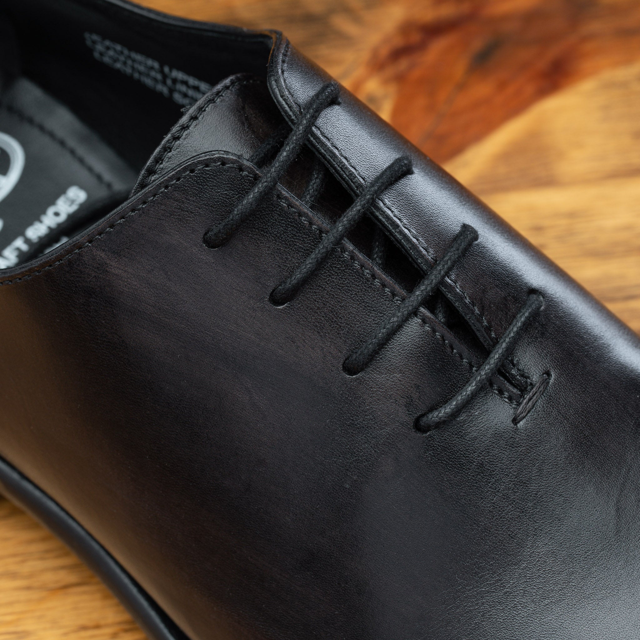 Up close picture of the 4 eyelet of Q550 Calzoleria Toscana Graphite Cayenne Calf Wholecut