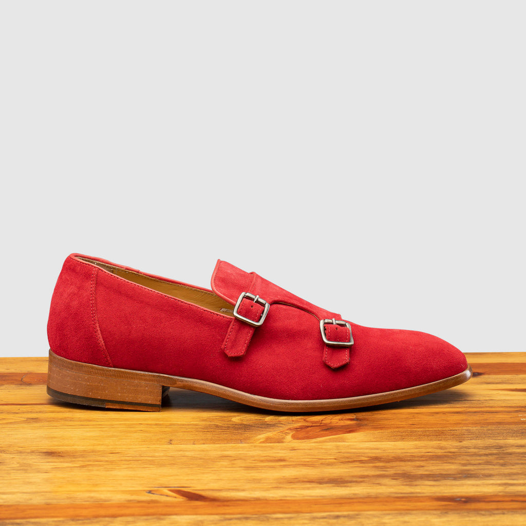 Side profile of Z893 Calzoleria Toscana Red Suede Double Strap Low Vamp Slip-On on top of a wooden table